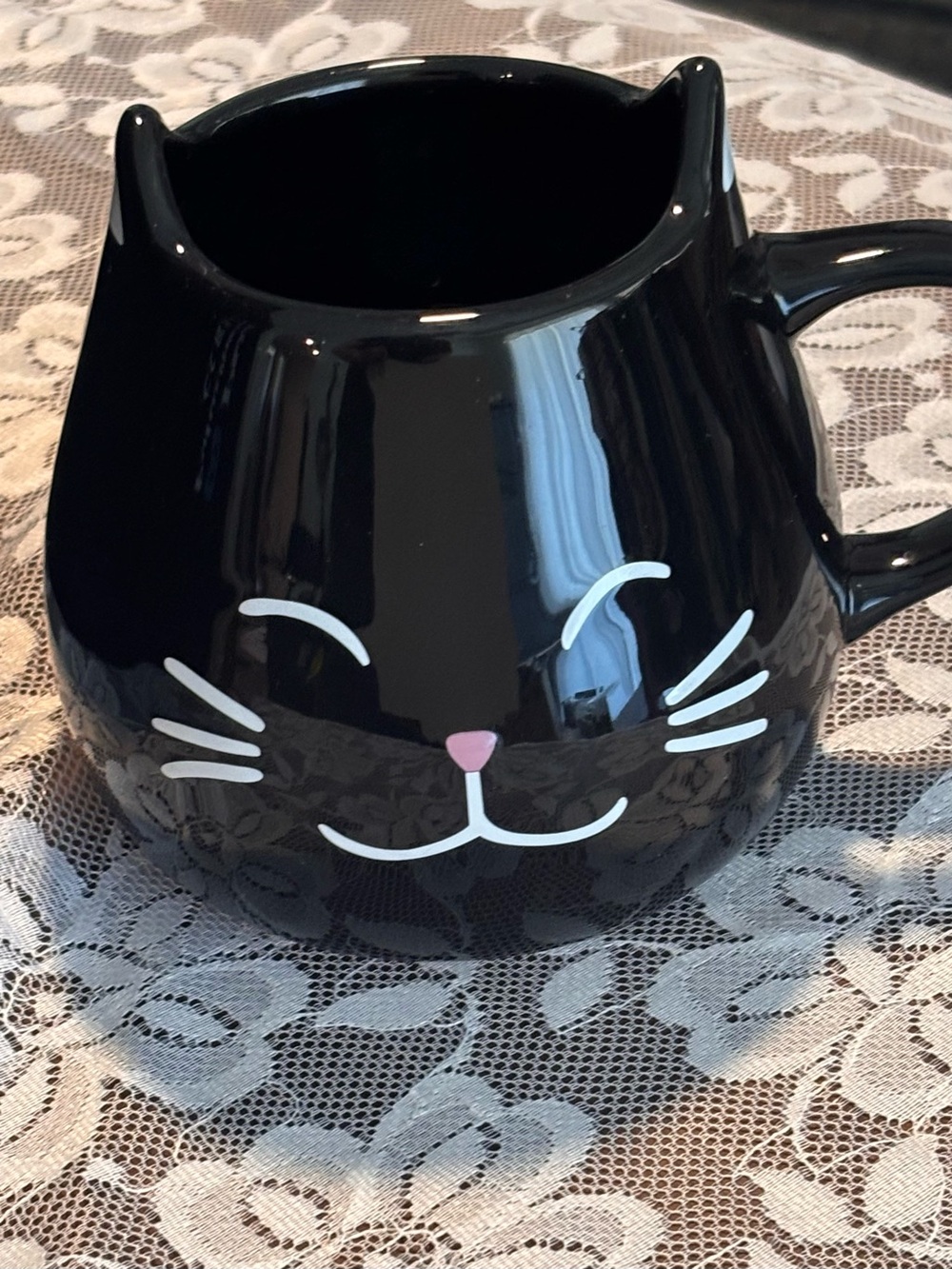 Very cute Ceramic Mug, Smiling Black Cat w Ears on Rim, Paw Print Inside.